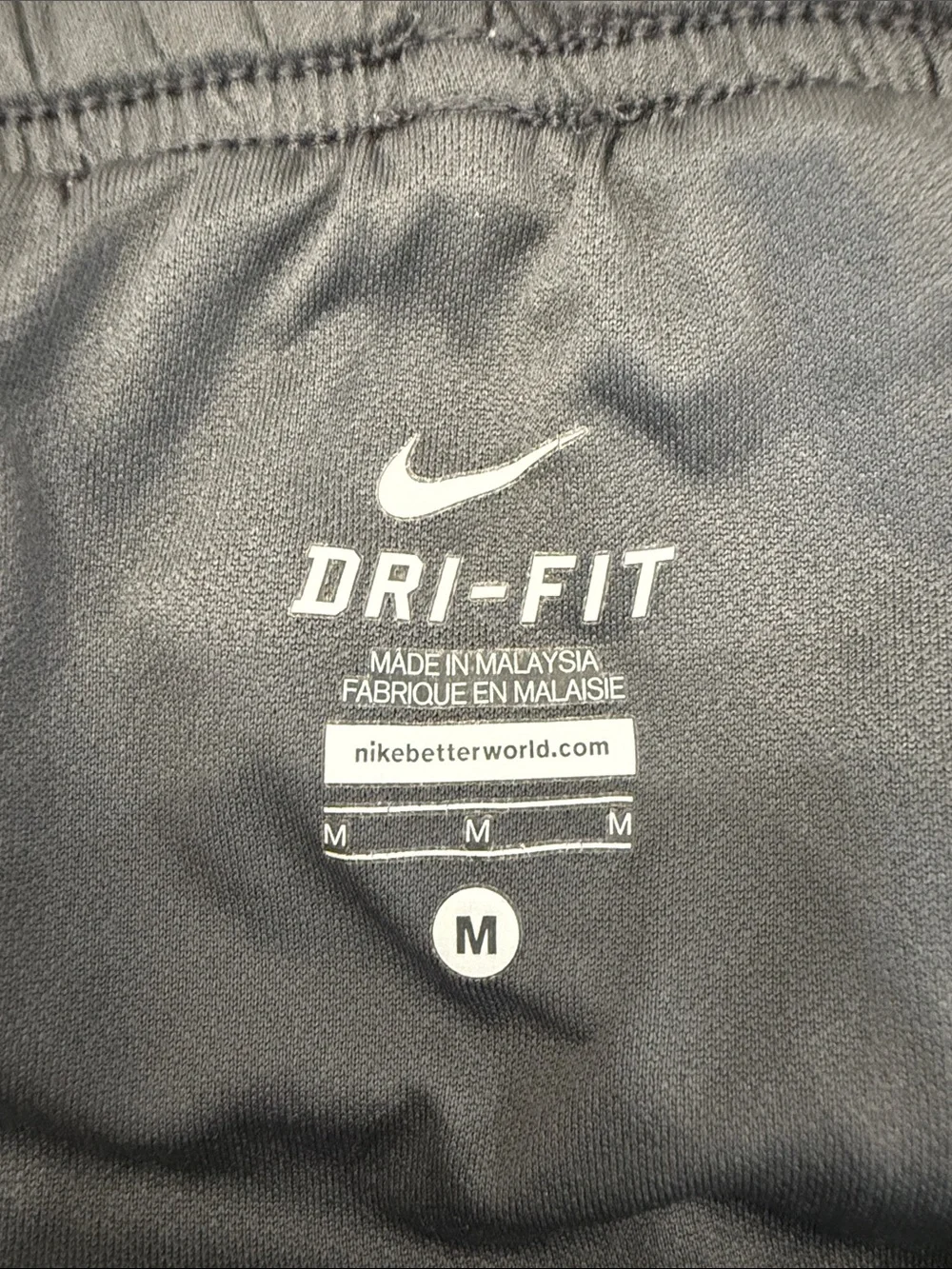 Nike Women's Dark Gray Athletic Shorts with Reflective Swoosh